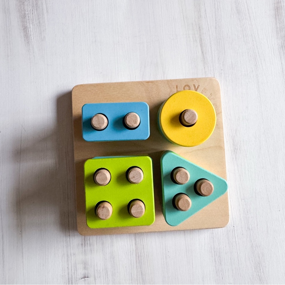 Lovevery Sort & Stack peg puzzle toy